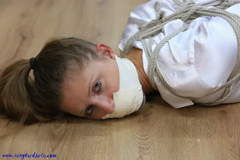 Pigtailed Woman Bound and Taped in the Office Pantyhose – photo 15 of 16