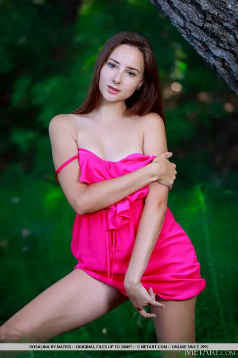 Brunette Lifts Her Skirt and Spreads Her Shaved Pussy Among Trees – photo 4 of 18