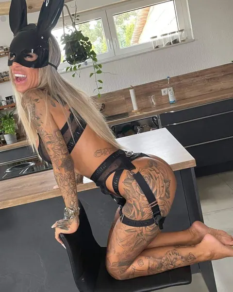 Blonde with Big Tits Shows Her Tattoos in Lingerie – photo 3 of 14