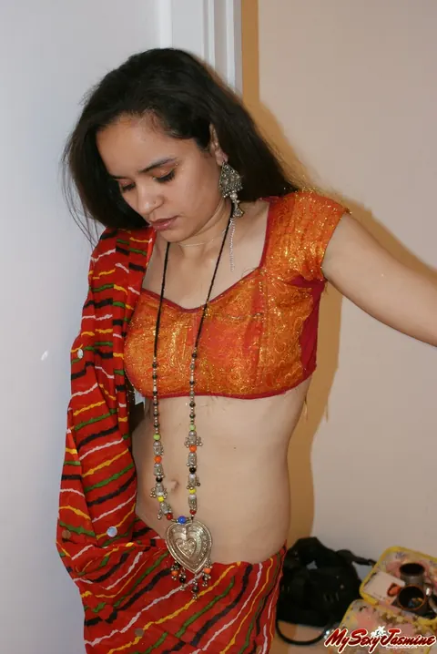 Jasmine Mathur: Indian Brunette in a Skirt and Panties Reveals Her Natural Tits – photo 4 of 12