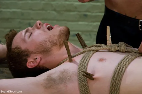 Two Naked Men in Bondage Play with a Dildo – photo 11 of 21
