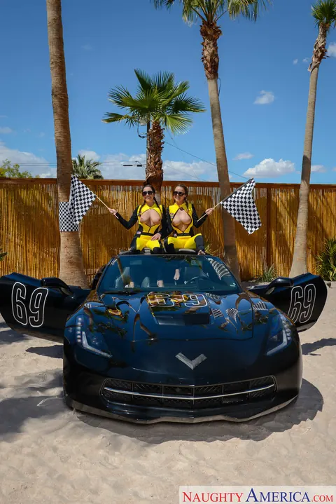 Dillion Harper: Busty Brunettes in Uniform and Heels Share a Cock on a Sports Car – photo 11 of 21