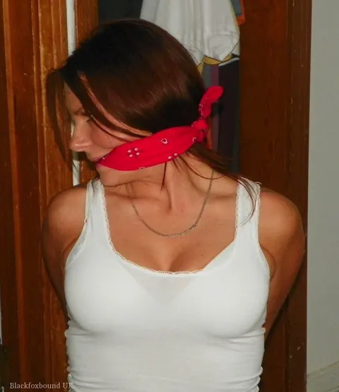 Tattooed Redhead Bound and Gagged on the Bed Spreads Her Legs – photo 3 of 14