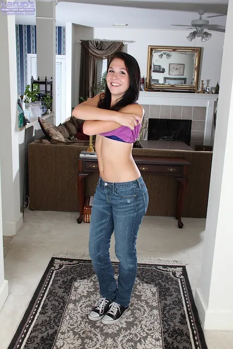 Slim Brunette Strips Out of Her Jeans and Exposes Her Pussy – photo 1 of 16