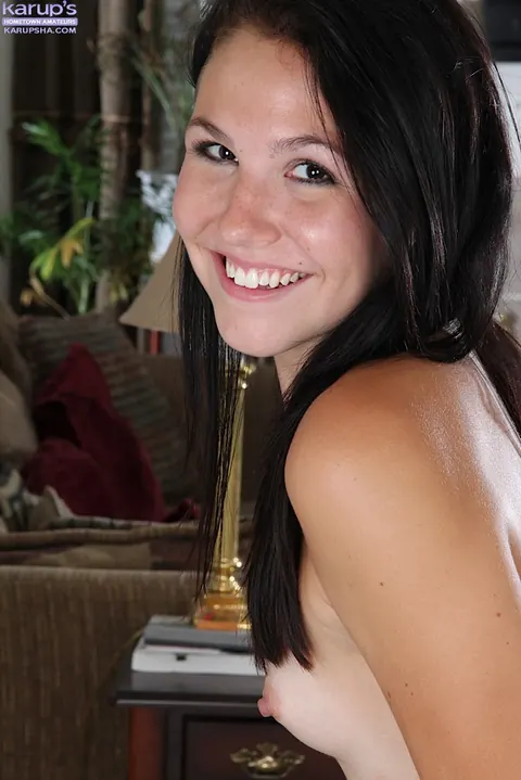 Slim Brunette Strips Out of Her Jeans and Exposes Her Pussy – photo 11 of 16