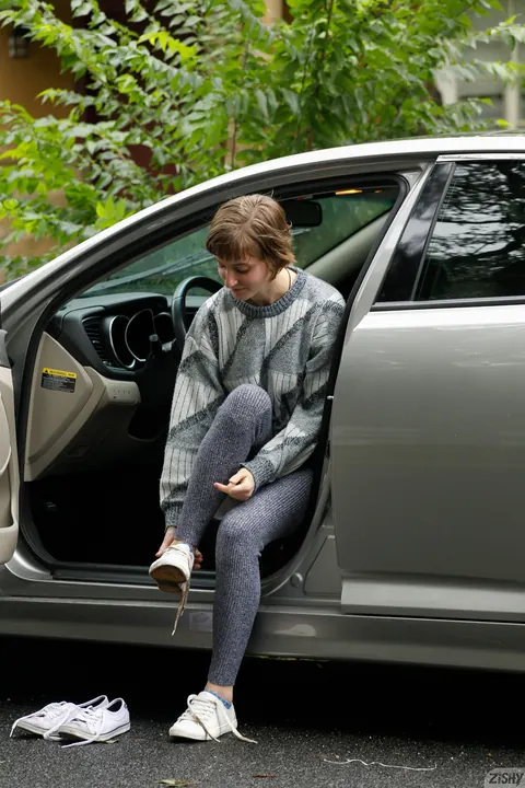 Thick Brunette Spreads Her Hairy Pussy Outdoors by a Car – photo 2 of 12