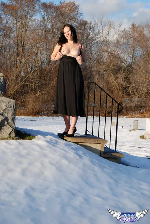 Emily Love: Brunette Flashes Her Natural Tits in a Winter Graveyard – photo 7 of 12