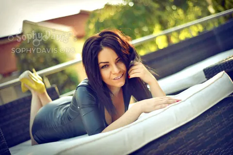 Sophy Davis: Thick Brunette with Big Tits Poses in a Tight Dress and High Heels – photo 15 of 15
