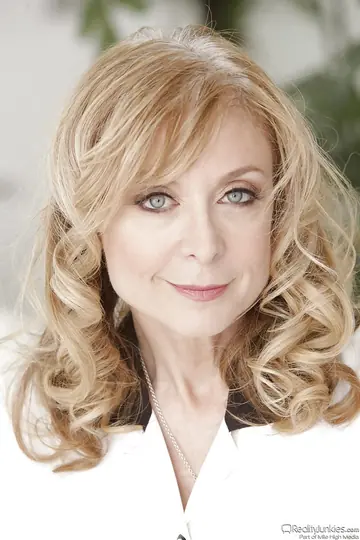 Nina Hartley – Mature Blonde Strips Out of Her Dress and Spreads Her Legs Wide