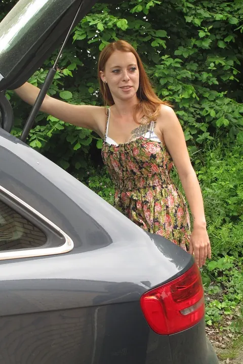 German Redhead Fingers Herself and Fucks in a Public Car – photo 3 of 20