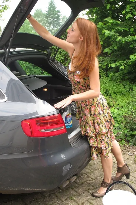 German Redhead Fingers Herself and Fucks in a Public Car – photo 1 of 20