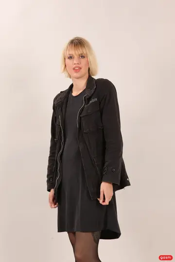 Blonde German MILF with Short Hair Poses Fully Clothed