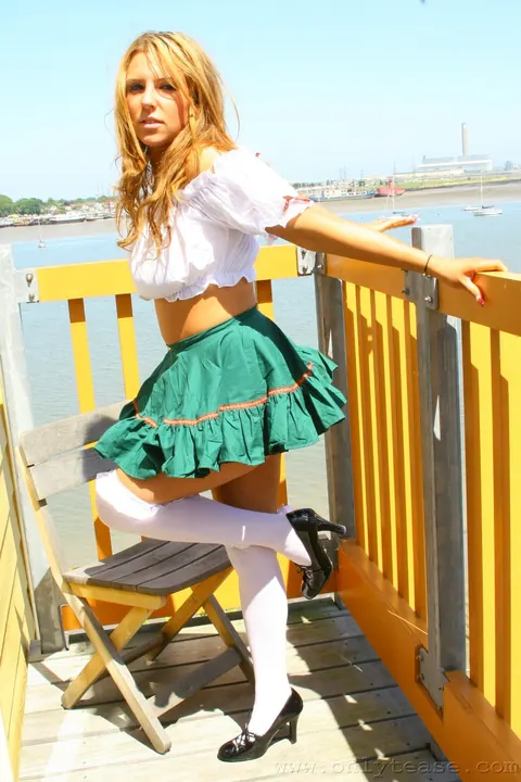 Daryl M: Busty Brunette in a Skirt and Heels Spreads Outdoors – photo 12 of 21