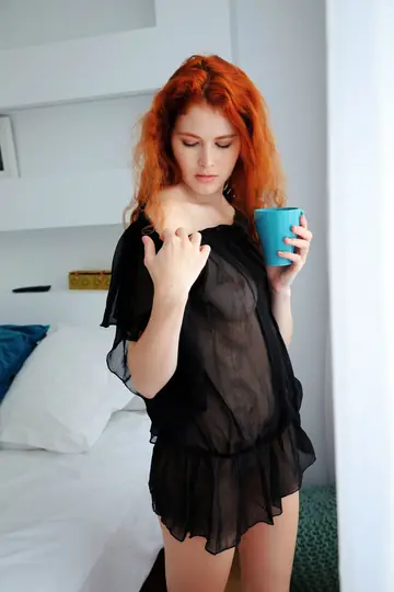 Thick Redhead in Lingerie and Skirt Masturbates Her Shaved Pussy
