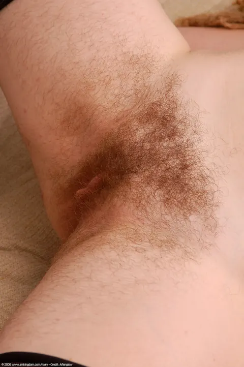 Woman Undresses and Reveals Her Hairy Pussy – photo 19 of 21