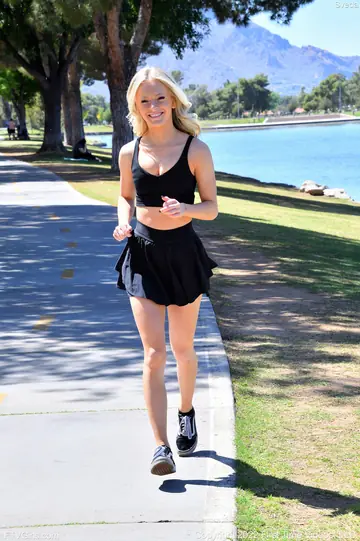 Thick Blonde Flaunts Her Small Tits and Big Ass in a Skirt and Socks
