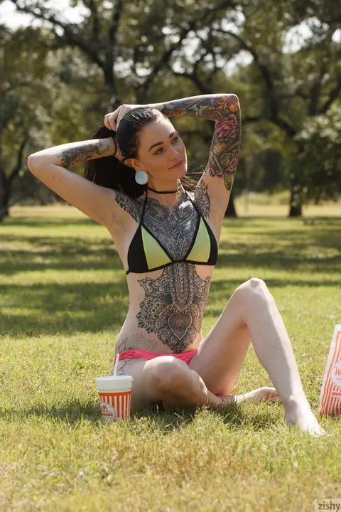 Kelly Lamprin: Brunette in a Bikini and Glasses Spreads in the Park – photo 2 of 11