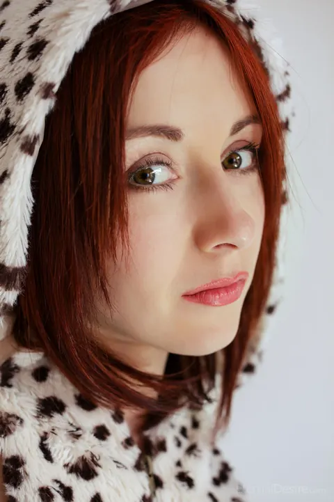 Redhead Strips Off Her Top and Spreads Her Hairy Pussy on the Coffee Table – photo 1 of 16
