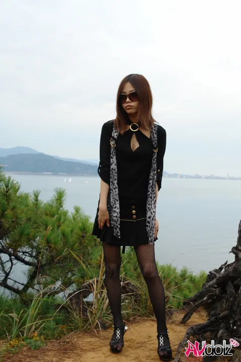Japanese Redhead Strips Out of Her Pantyhose by the Ocean – photo 1 of 15