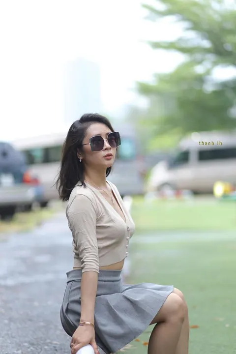 Asian Brunette Lifts Her Skirt Outdoors – photo 11 of 21