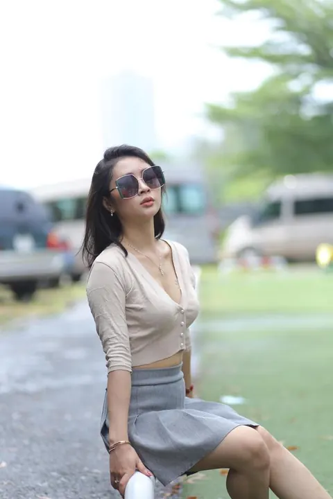 Asian Brunette Lifts Her Skirt Outdoors – photo 8 of 21