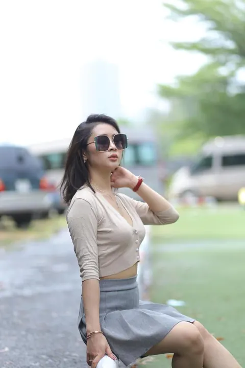 Asian Brunette Lifts Her Skirt Outdoors – photo 9 of 21