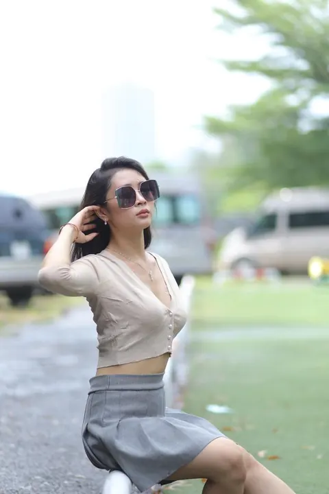 Asian Brunette Lifts Her Skirt Outdoors – photo 6 of 21