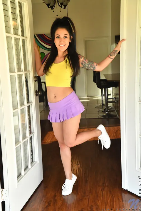 Jynx Correra: Tattooed Brunette in Glasses Strips and Fingers Her Pussy – photo 2 of 16