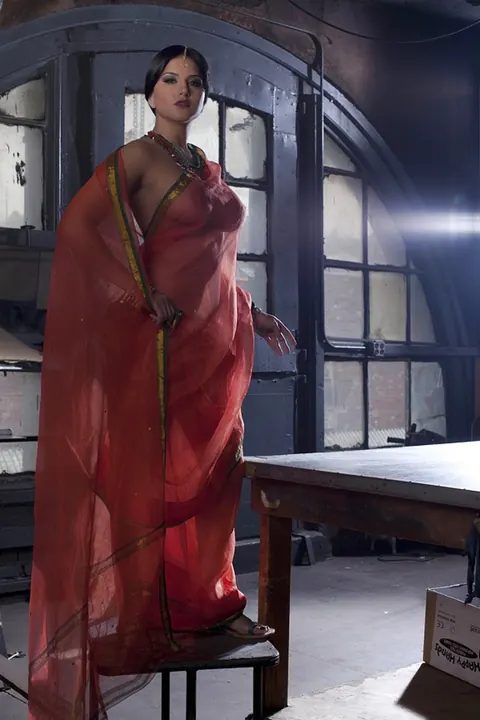 Sunny Leone: Busty Indian MILF Strips Out of Her See-Through Attire – photo 3 of 15