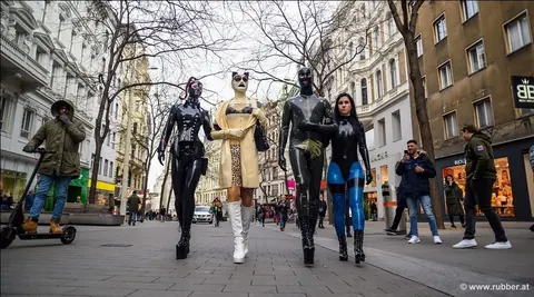 Pigtailed Woman in Latex and Heels Strolls Public Streets – photo 14 of 16