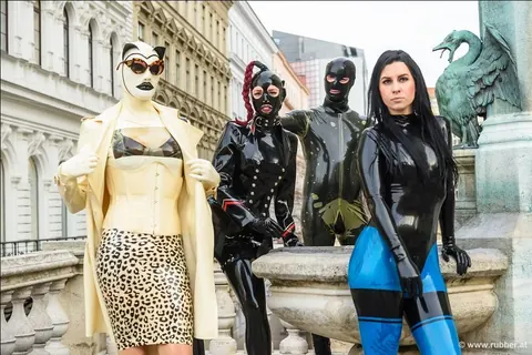 Pigtailed Woman in Latex and Heels Strolls Public Streets – photo 15 of 16