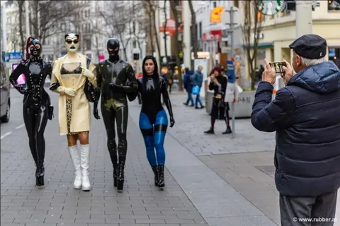 Pigtailed Woman in Latex and Heels Strolls Public Streets – photo 10 of 16