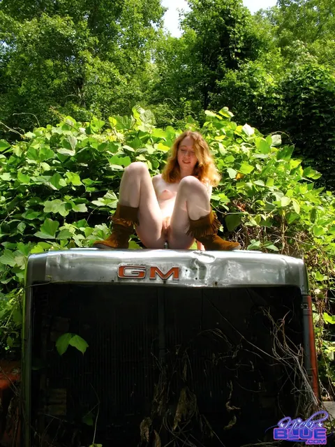 Nicki Blue: Redhead PAWG Undresses and Spreads on a Tractor in the Forest – photo 9 of 20