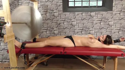 Busty Brunette Bound and Gagged on Massage Table – photo 7 of 16