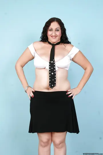 Redhead Latina MILF Strips Out of Her Uniform and Skirt
