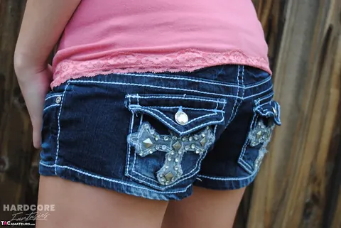 Whitney Stevens: Busty Brunette Poses in Denim Shorts by the Backyard Fence – photo 16 of 16