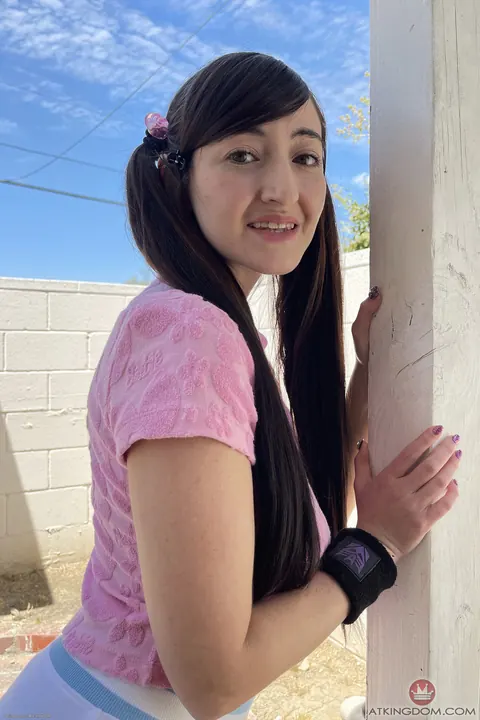 Tifa Quinn: Slim Brunette in Pigtails Poses and Spreads Her Legs – photo 1 of 21
