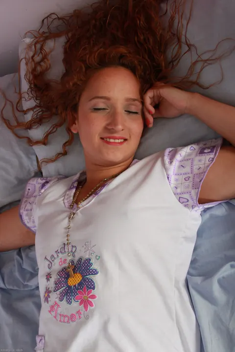 Curly Redhead Reveals Her Hairy Crotch and Big Ass in Bed – photo 1 of 20