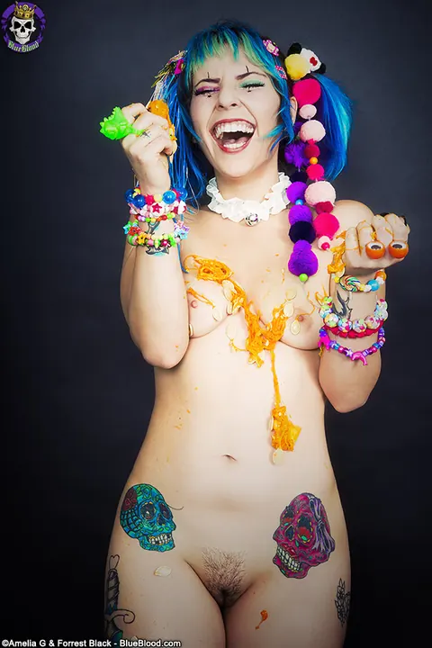 Woman with Pigtails Strips While Carving a Pumpkin and Spreads – photo 6 of 15