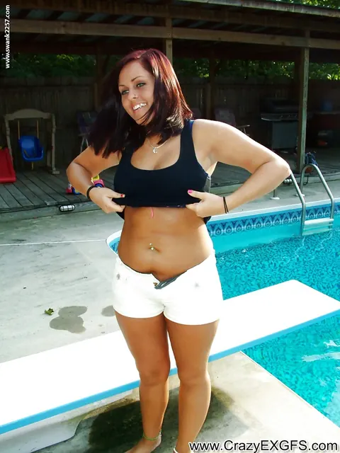 Brunette with Big Tits Strips Out of Her Shorts by the Pool – photo 7 of 16