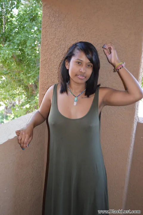 Ebony Woman Undresses and Shows Her Hairy Pussy – photo 2 of 20