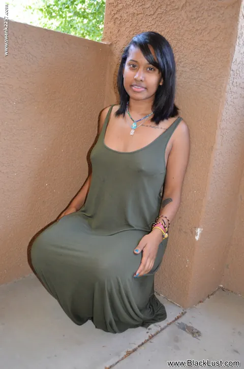 Ebony Woman Undresses and Shows Her Hairy Pussy – photo 9 of 20