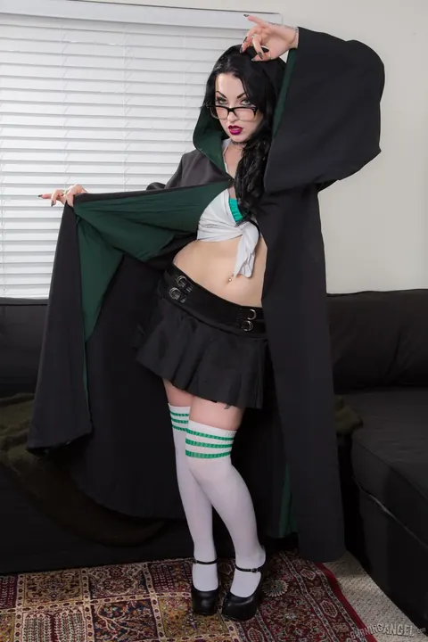Draven Star: Busty Brunette in Glasses Sheds Her Costume and Fingers Her Pussy – photo 4 of 17