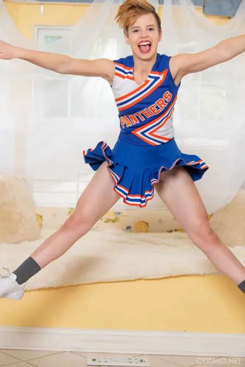 Thick Redhead with Short Hair Lifts Her Cheer Skirt – photo 3 of 16