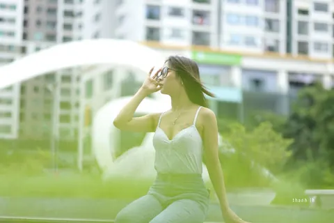 Asian Woman Poses Outdoors in Tight Jeans and a White Top – photo 8 of 21
