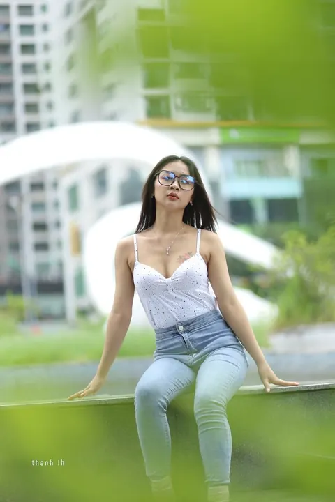 Asian Woman Poses Outdoors in Tight Jeans and a White Top – photo 2 of 21