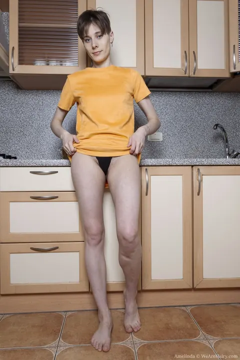 Amelinda: Short-Haired Brunette Strips Out of Her Skirt in the Kitchen – photo 2 of 21