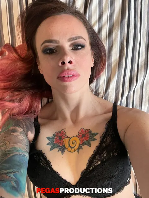 Tattooed MILF Strips Topless and Shows Her Small Tits – photo 18 of 20