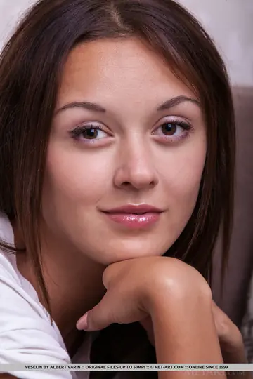 Veselin – Slim Brunette in Shorts Spreads Her Long Legs and Shaved Pussy
