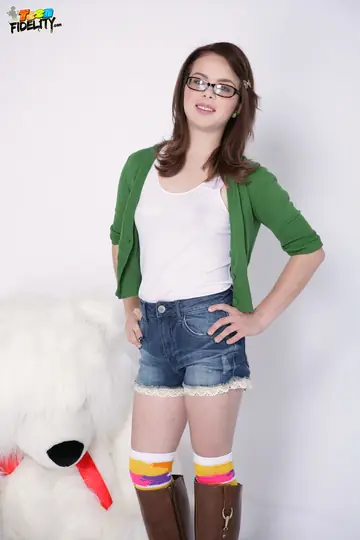 Skinny Brunette in Glasses Strips Outdoors